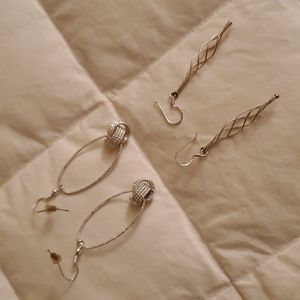 Two pair of silver earrings